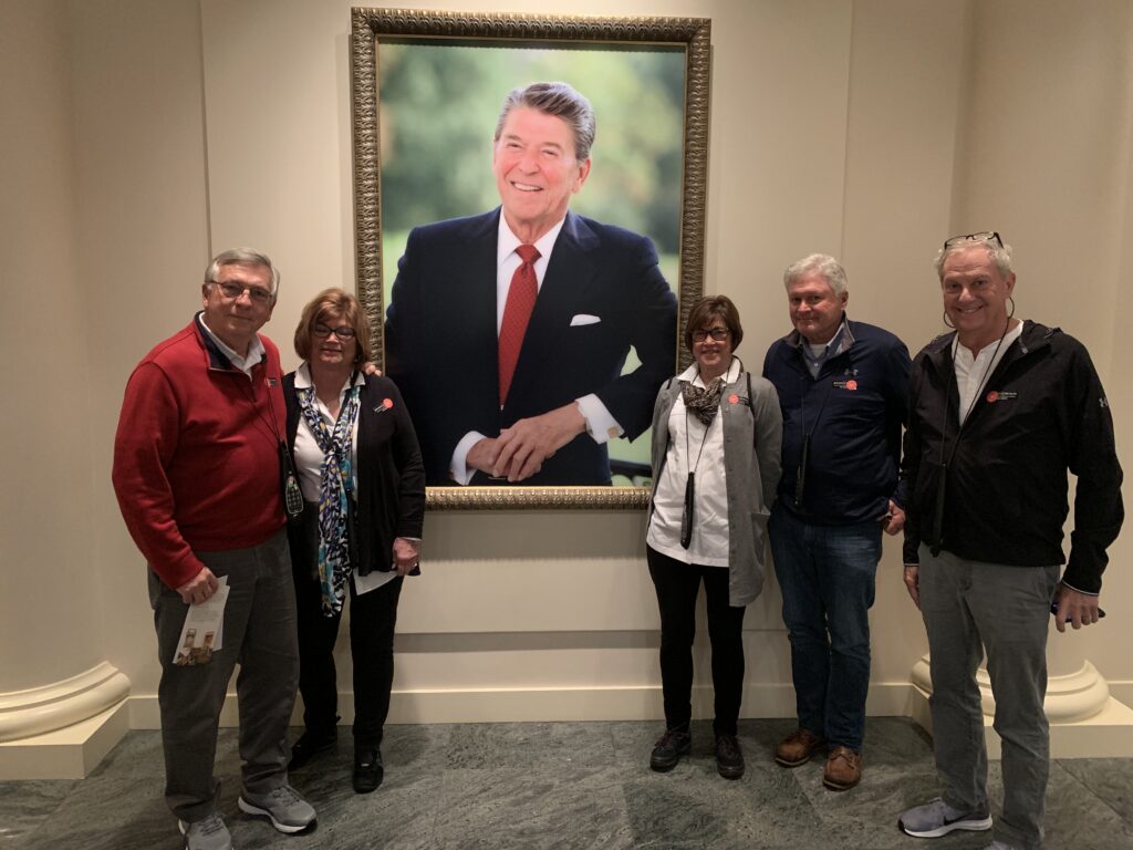 Five people inside a Reagan Presidential Library